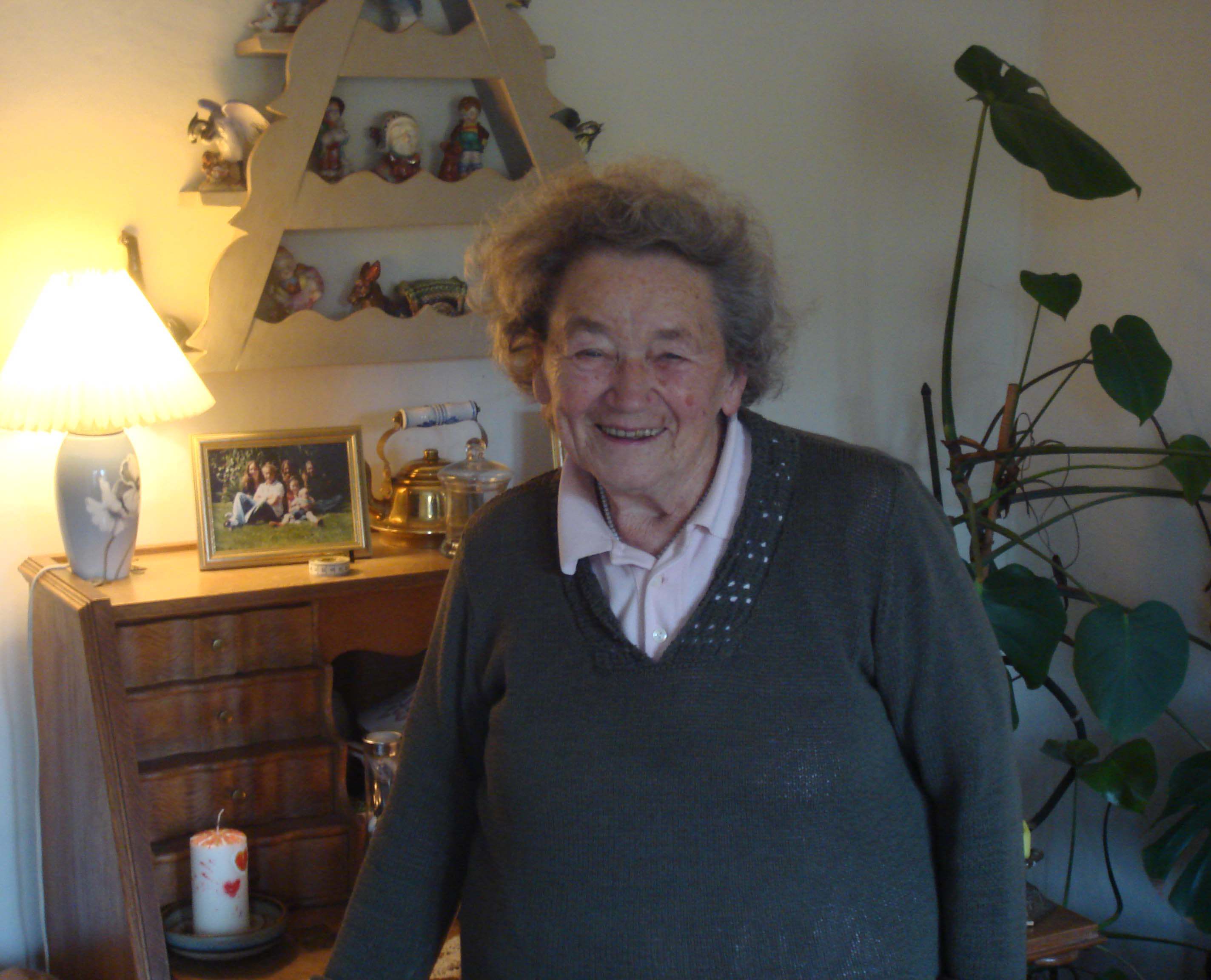 Ældre dame der smiler.